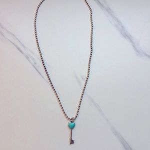Authentic Tiffany’s Blue Heart/Key Charm Necklace.